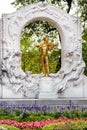 Golden monument of Johann Strauss in Stadtpark Royalty Free Stock Photo