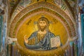 Golden mosaic with Christ Pantocrator in the apse of CefalÃÂ¹ Cathedral. Sicily, southern italy.