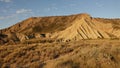 Golden mountain at Las Bardenas Reales semi desert in Navara, Spain Royalty Free Stock Photo