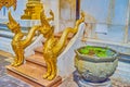 Golden Naga serpents at the entrance to Ubosot of Wat Bowonniwet Vihara, Bangkok, Thailand