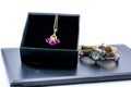 Golden necklace in a box and two beautiful watches Royalty Free Stock Photo