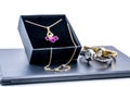 Golden necklace in a box and two beautiful watches Royalty Free Stock Photo