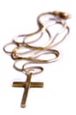 Golden necklace with cross