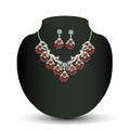 Golden necklace and earrings female with red preci