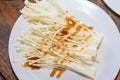 golden needle mushroom Ingredients and raw materials eating shabu, Sukiyaki, and pork on a white plate