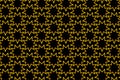 Golden nine pointed star on black background