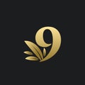 Golden Number Nine logo with gold leaves