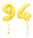 Golden number ninety four 94 made of inflatable balloon with ribbon on white Royalty Free Stock Photo