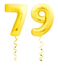 Golden number seventy nine 79 made of inflatable balloon with ribbon on white Royalty Free Stock Photo