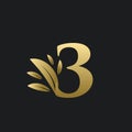 Golden Number Three logo with gold leaves