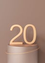 Golden number twenty standing on podium on brown background. Symbol 20. Invitation for a twentieth birthday party