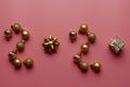 Golden numbers 2020 and Christmas decorations on color back Royalty Free Stock Photo