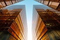 golden office building facade and blue sky, real estate business