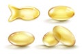 Golden oil capsule set. Realistic shiny medicine pills with gold yellow fish oil or omega 3 vitamin supplement isolated on Royalty Free Stock Photo