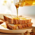 Golden olive oil being poured on toasted bread slice on wooden board Royalty Free Stock Photo