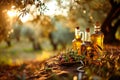 Golden olive oil bottles with olives leaves and fruits