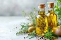 Golden olive oil and vinegar bottles with thyme and aromatic herbs leaves Royalty Free Stock Photo