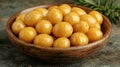 Golden olives in a wooden bowl Royalty Free Stock Photo