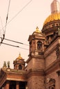 Golden onions of Saint Isaak& x27;s cathedral. Sepia tone photo.