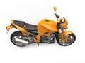 Golden orange cool sports motorcycle - top down side view