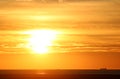 Golden orange sunset over sea, sands and ship Royalty Free Stock Photo