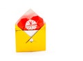 Golden origami envelope with red paper heart isolated on white