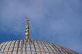 Golden ornament on top of the dome of Hagia Sophia, in Istanbul, Turkey. Architectural detail