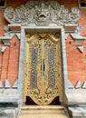 Golden ornamental door in Bali