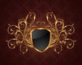 Golden ornate frame with shield Royalty Free Stock Photo