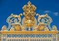 Golden ornate gates of Chateau de Versailles over blue sky, Pari Royalty Free Stock Photo