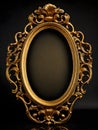 golden oval vintage frame isolated on black background with clipping paths. Gold frame on a wooden background. Gold oval frame on Royalty Free Stock Photo