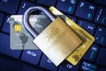 Padlock on Top of Credit Cards on Keyboard Cyber Security Concept