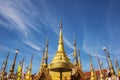 Golden pagoda and blue sky at Phra Borommathat temple Tak Province ,Thailand.