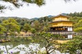 Golden pagoda on lake in autumn at Kinkakuji Temple, Kyoto, Japan.