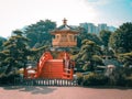 Orange and teal view of Pavilion of Absolute Perfection, Lian Garrden Hong Kong