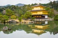 Golden pagoda and reflection on lake in autumn at Kinkakuji Temp Royalty Free Stock Photo