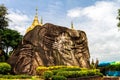 Golden pagoda sculpture,stone carving at Wat Tham Pha Daen.Sakon Nakhon,Thailand Generality in Thailand,and kind of art decorated Royalty Free Stock Photo