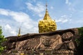 Golden pagoda sculpture,stone carving at Wat Tham Pha Daen.Sakon Nakhon,Thailand Generality in Thailand,and kind of art decorated Royalty Free Stock Photo