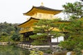 Golden pagoda and tree on lake in the garden at Kinkakuji Temple Royalty Free Stock Photo