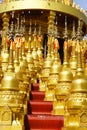 Golden pagoda at Wat pa sawang boon temple. Royalty Free Stock Photo