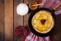 Golden pancakes with cranberry jam Royalty Free Stock Photo