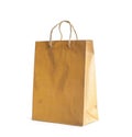 Golden paper shopping bag isolated. Space for design Royalty Free Stock Photo