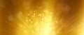 Golden particles shining stars dust bokeh glitter with flare awards abstract background. Royalty Free Stock Photo