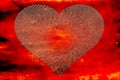 Golden pattered heart on red background