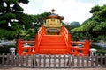 Golden pavilion with red bridge in Chinese garden