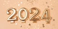 Golden 2024 on a peach color background.