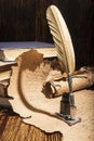 Golden pen and ancient manuscripts