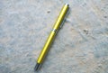 Golden Pen on textual background Royalty Free Stock Photo