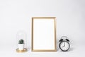 Golden photo frame mock up and clock Interior decor home elements