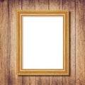 Unique Golden picture frame on old wooden wall background texture Royalty Free Stock Photo